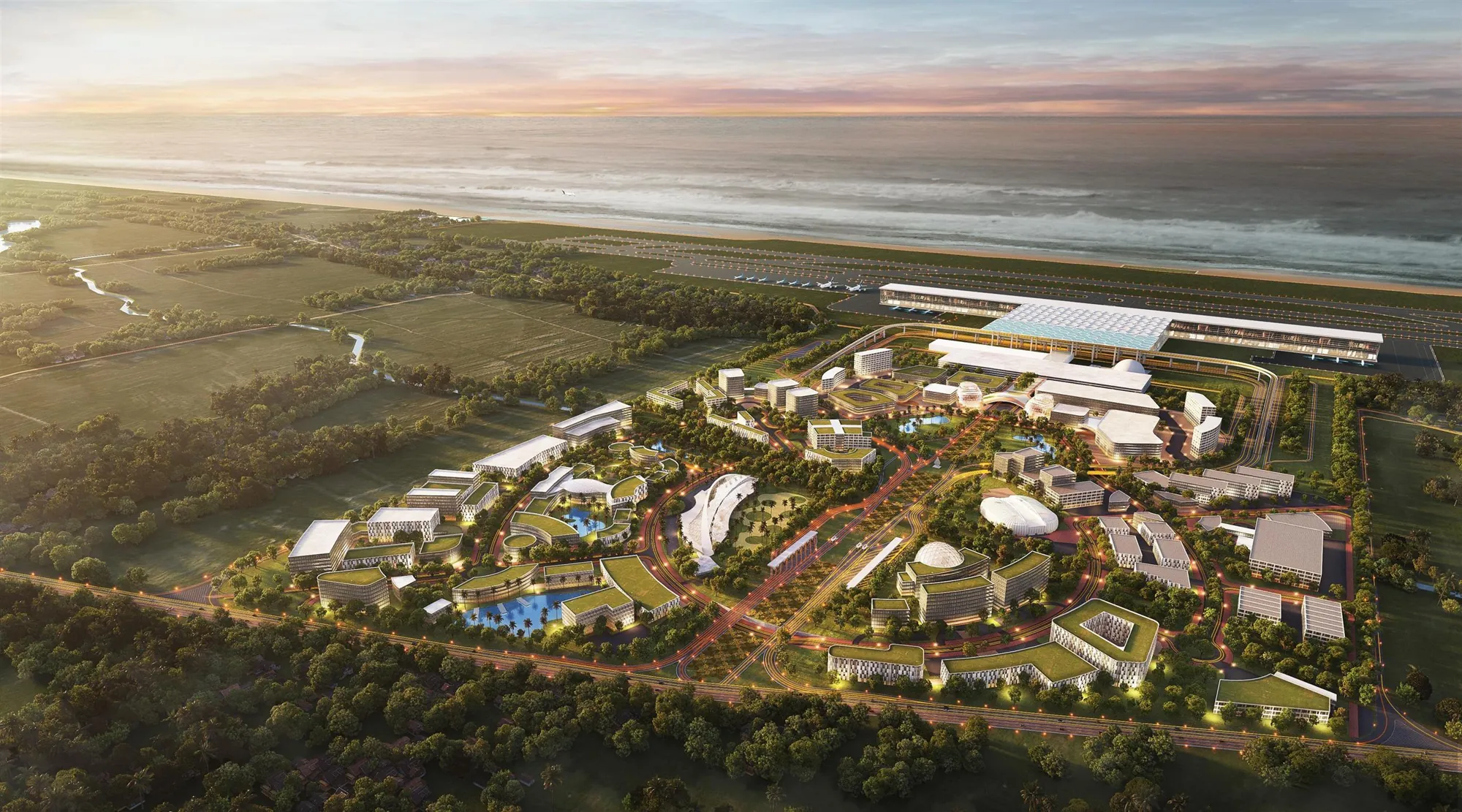 Aerial view of a coastal masterplan at sunset